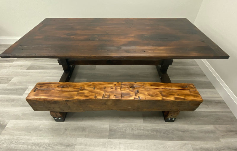 Reclaimed barn beam bench with black steel reinforcements with walnut reclaimed barn dining table