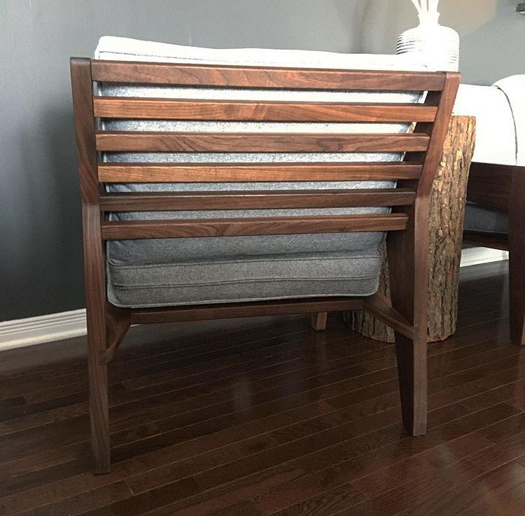 Solid walnut armchair with grey tweed cushions.  Back view .  