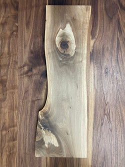 Walnut charcuterie board with a live edge