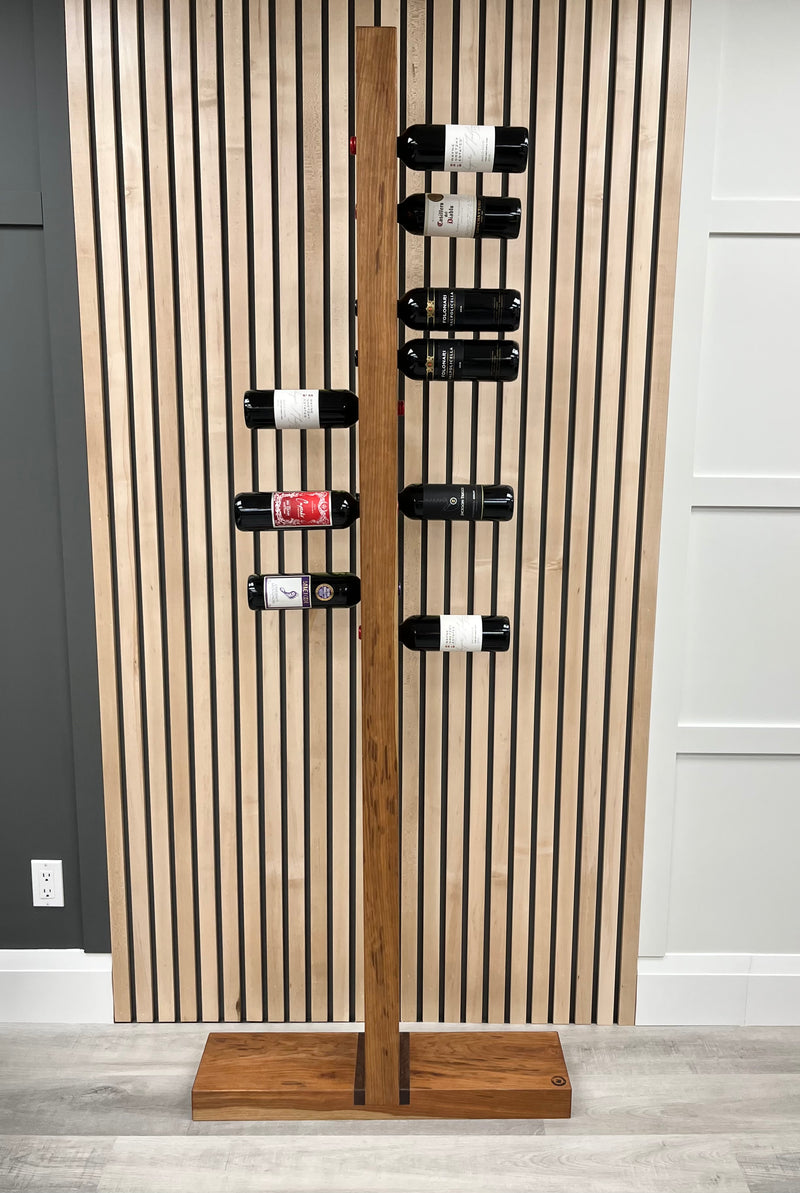 Solid black cherry vertical wine rack with walnut accents. Shown with wine bottles.