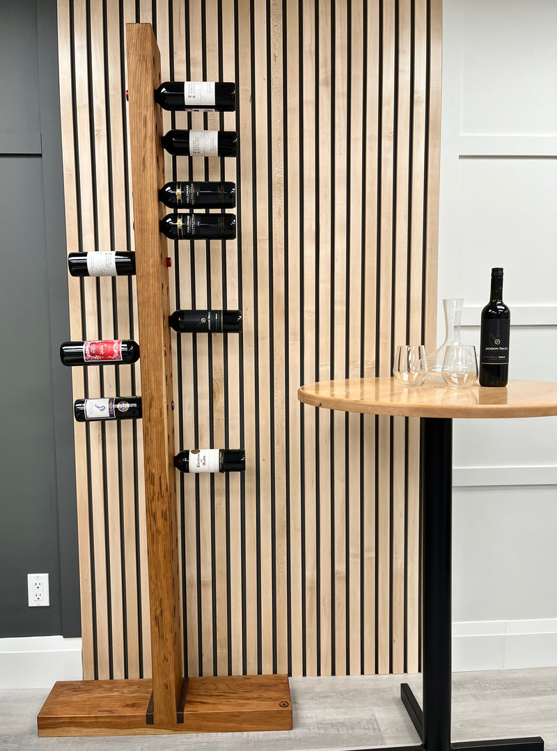 Solid black cherry vertical wine rack with walnut accents. Shown with wine bottles.