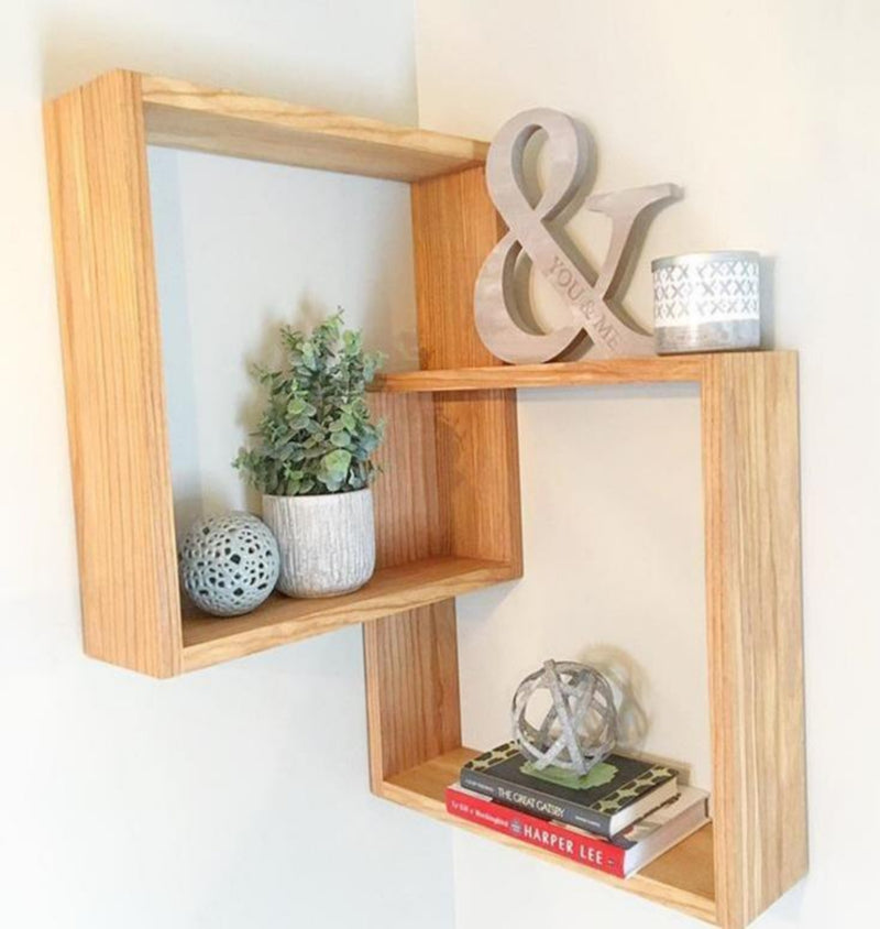 Linked Wall Shelf With Fake Plant, Ornaments and Books